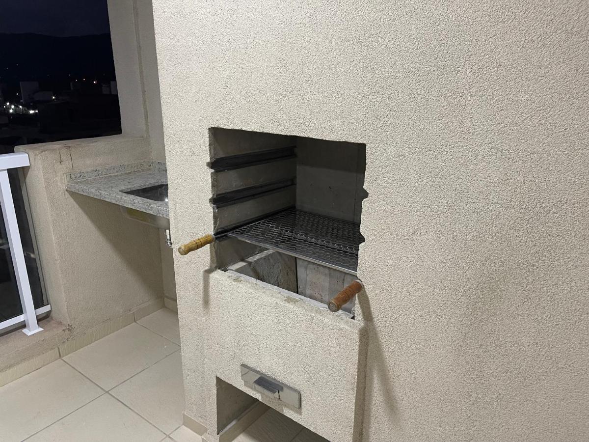 Lazer de resort a poucos passos da praia Guarujá Exterior foto